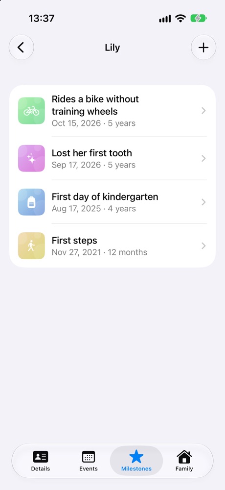 Lily's milestones: rides a bike, lost her first tooth, first day of kindergarten, first steps